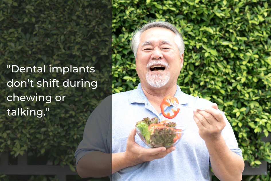 Older man holding a salad and smiling outdoors, with text beside him that reads, "Dental Implants vs Dentures: Dental implants don’t shift during chewing or talking.